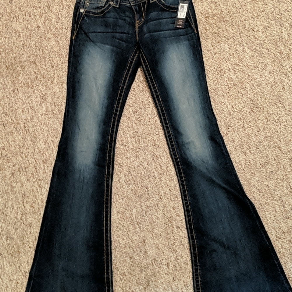 Miss Me mid rise flare jeans.  Inseam 34" waist 26
